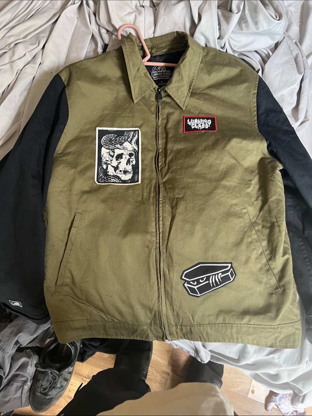 Olive Green and Black Military-Style Field Jacket with Patch Accents